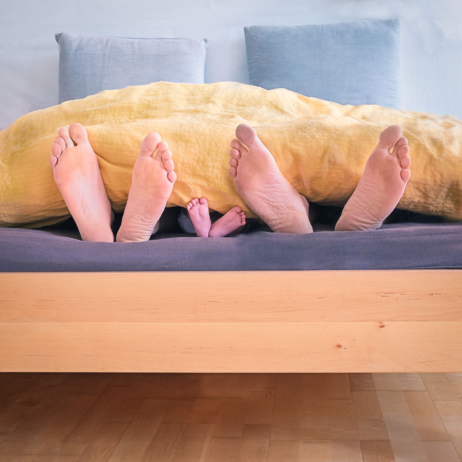 Feet in bed