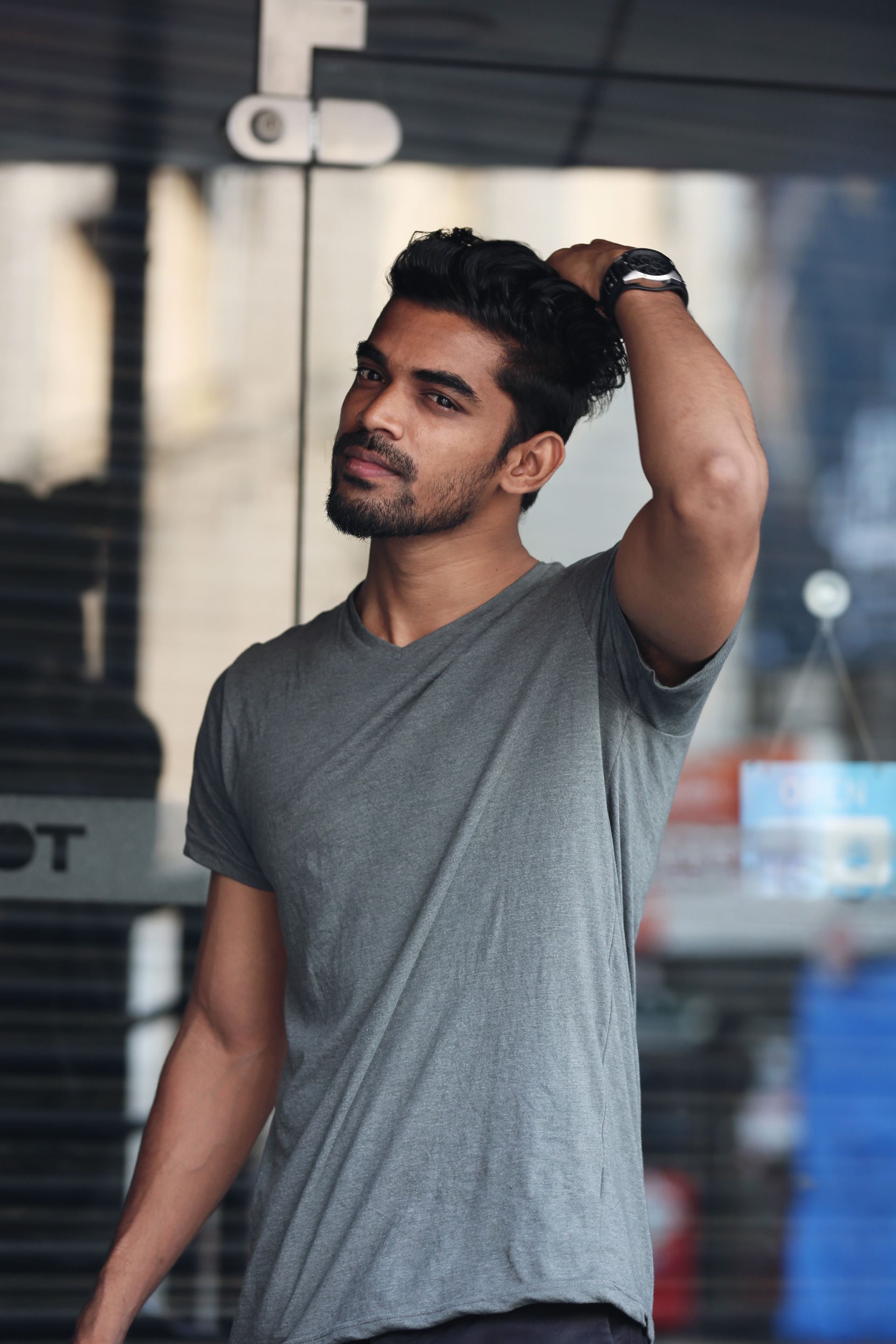 a man standing in front of a building